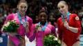 The USA's Biles (gold) and Ross (silver) at the Art. Gymnastics Worlds 2013